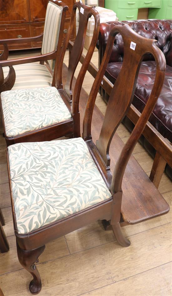 A pair of George I mahogany dining chairs